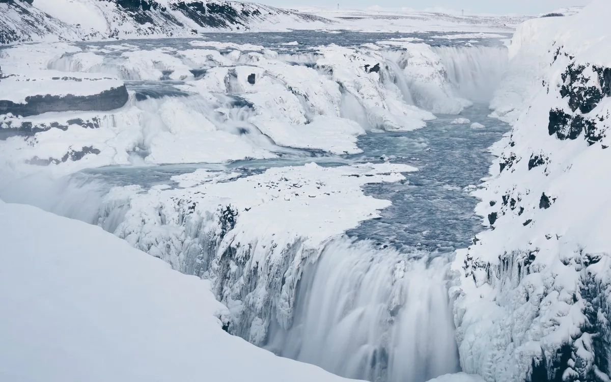Gullfoss waterfall surrounded by snow in winter
